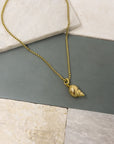 Figgy Conch Shell Charm