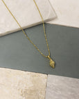 Figgy Ribbed Spiral Shell Charm